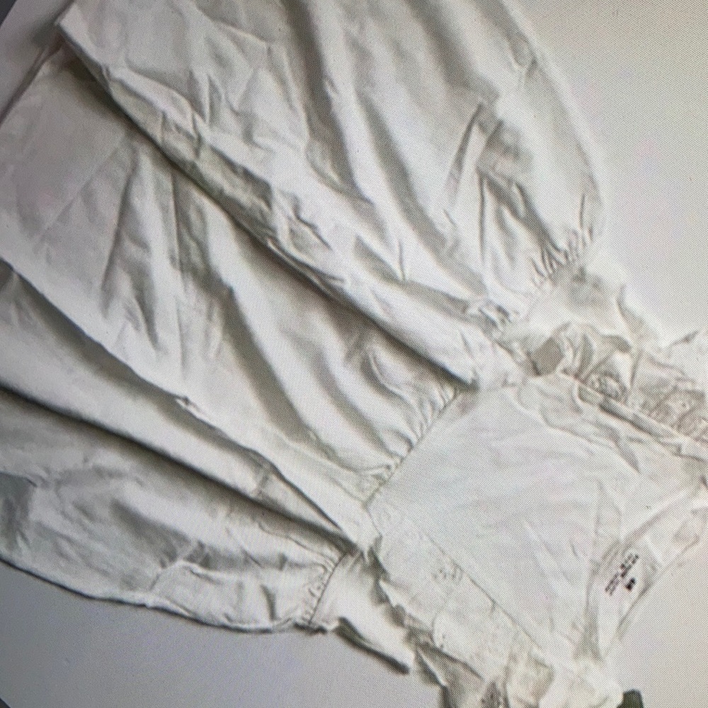 Flutter sleevess cotton jersey blouse